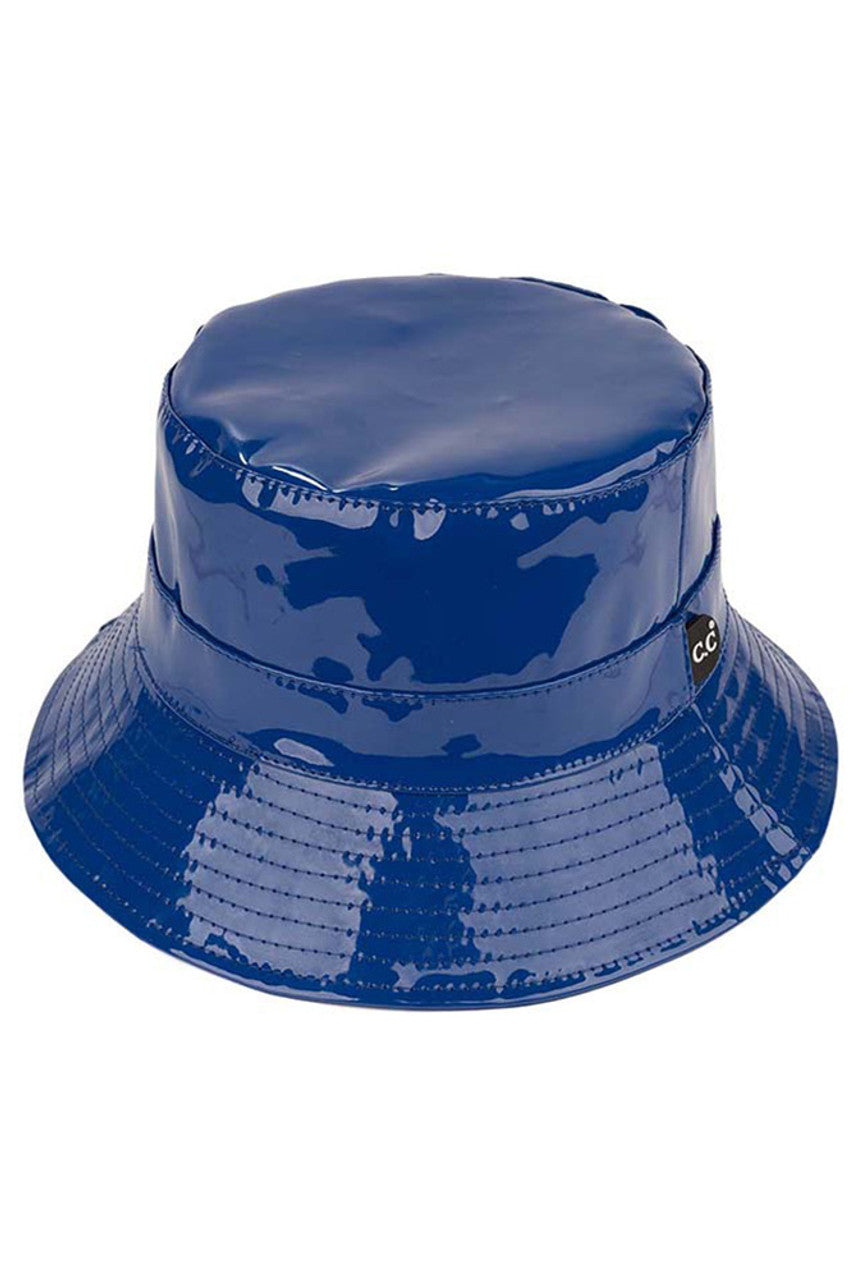 Royal C.C Brand Shiny Solid Color Reflective Enamel Detailed Rain Bucket Hat; this rain hat is snug on the head and works well to keep rain off the head, out of eyes, and also the back of the neck. Wear it to lend a modern liveliness above a raincoat on trans-seasonal days in the city. Perfect Gift for fashion-forward friend