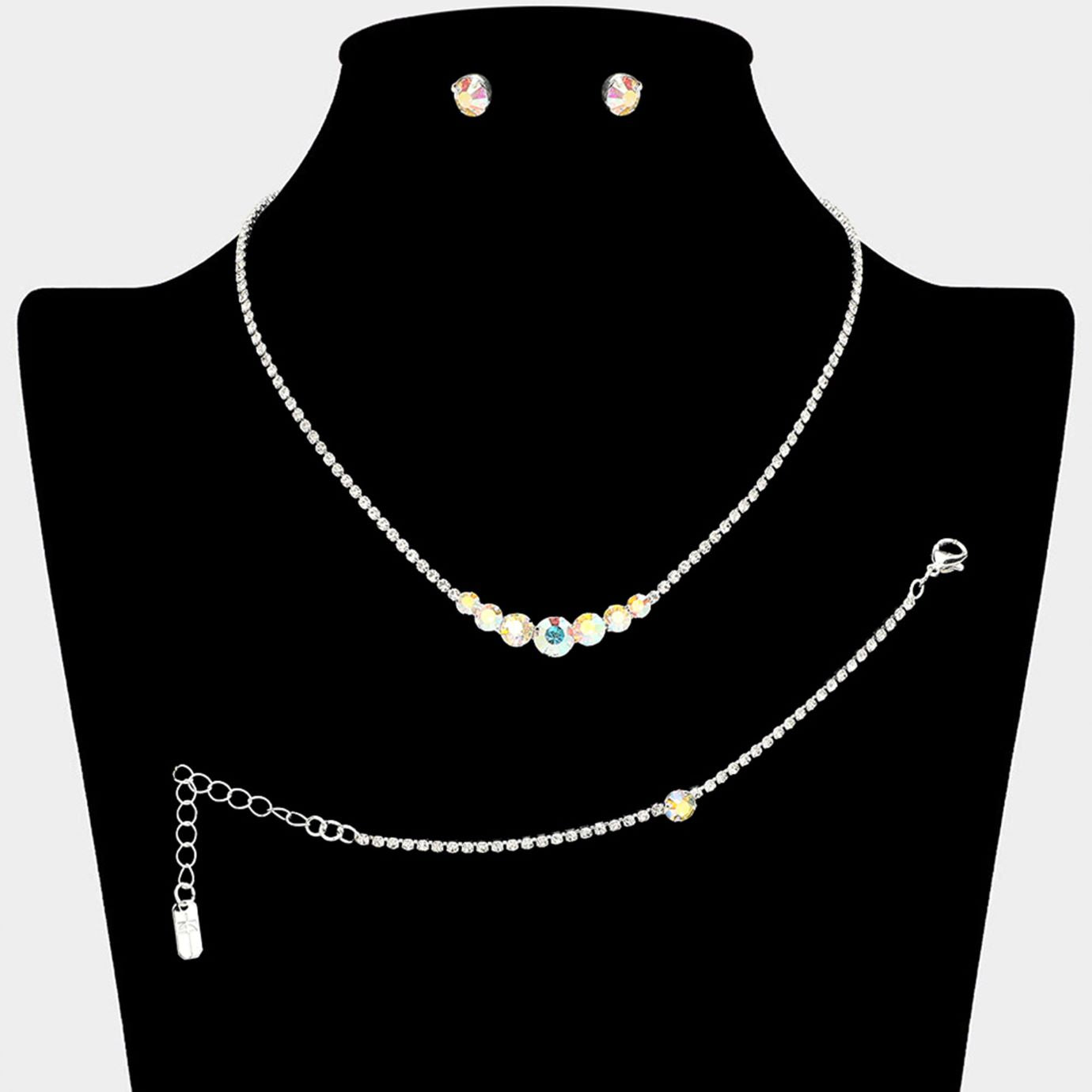 AB Silver Timeless matching necklace, stud earring, and bracelet set designed with a clean round stone centerpiece for effortless elegance. Ideal for weddings, formal events, parties, and everyday special occasion styling. A versatile set that delivers refined sparkle and coordinated sophistication.
