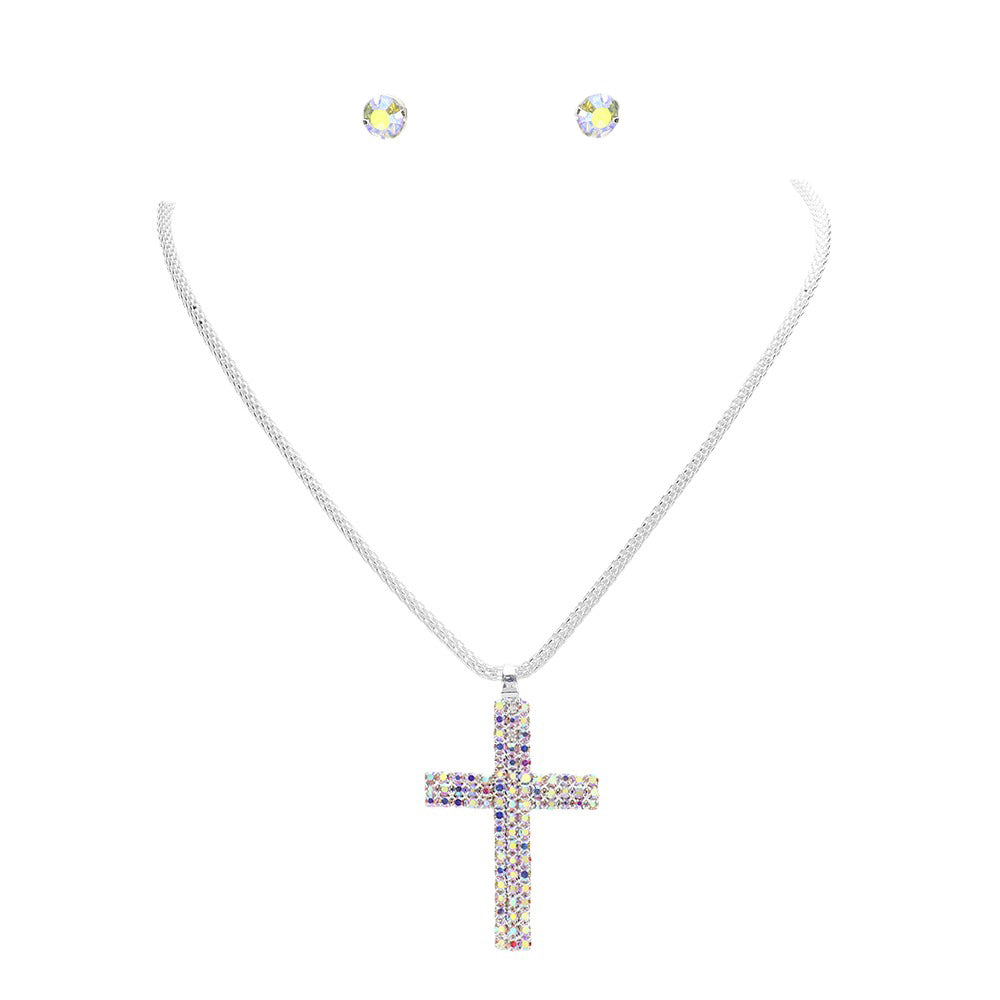 AB Silver Rhinestone Paved Cross Pendant Jewelry Set is exquisitely crafted from premium-grade metal alloy for a lasting shine. Its intricate design is adorned with shimmering rhinestones for an elegant look. The set includes a matching necklace and earrings. Perfect gift for religious friends and family members.