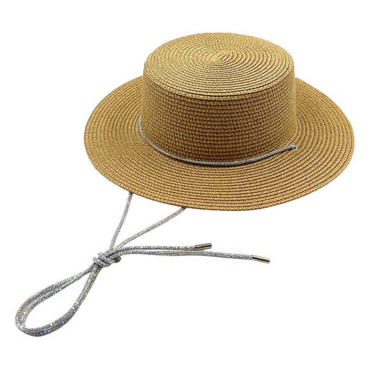 Beige Bling Chin Tie Straw Sun Hat! Introducing the perfect accessory for your sunny adventures. With its stylish bling detail and functional chin tie, this hat will keep you looking effortlessly chic while protecting you from the sun. Don't let the heat bother you, just tie the chin tie and enjoy the day.
