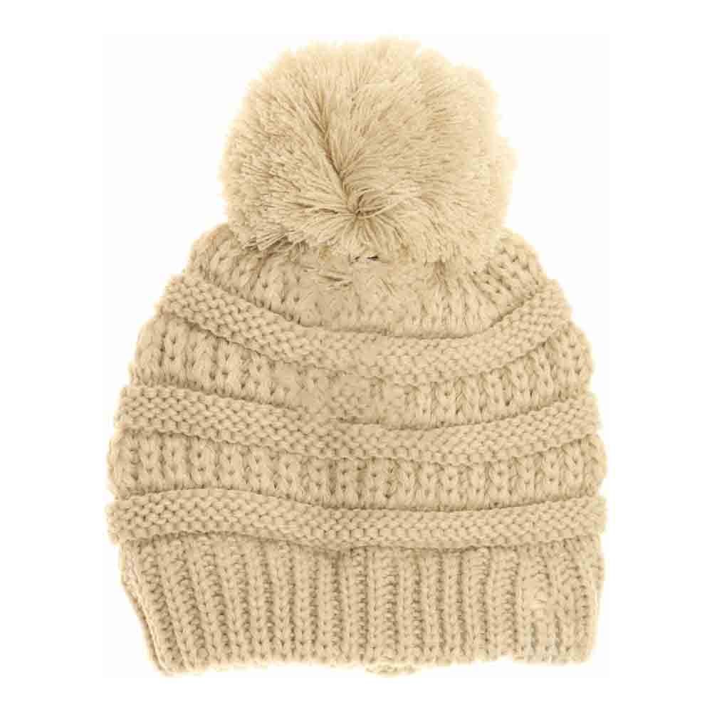 Beige Kids Solid Pom CC Beanies offer expert-level protection against cold weather with a focus on comfort and durability. Made from soft, insulating materials, they provide effective warmth while maintaining breathability. The solid color design ensures versatility, and the classic pom adds a playful yet refined detail. Tailored to fit securely on children’s heads, these beanies deliver reliable comfort for all outdoor activities in cooler temperatures