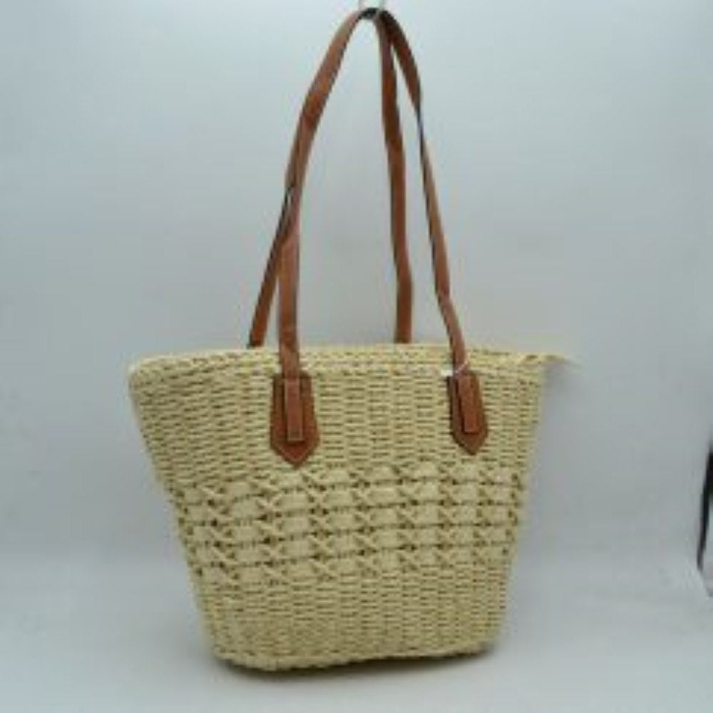 Beige This everyday tote bag showcases a multi-patterned textured woven body featuring horizontal open-weave detailing across the center. Designed for spacious daily storage, the main compartment is secured by a top zipper closure with an extended pull tab. Long, slim double shoulder straps are securely stitched to the front and back panels with pointed patch accents