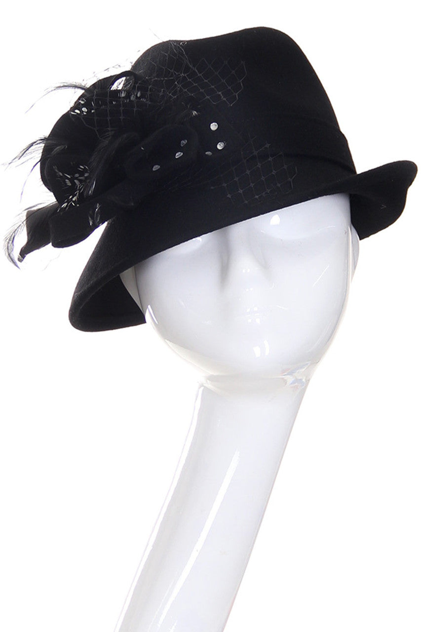 Black C.C. Wool Felt Hat combines exceptional craftsmanship with superior materials. Constructed from high-quality wool felt, it offers excellent shape retention and durability while providing effective protection from the elements. The classic silhouette ensures versatility across various outfits and occasions, making it an essential addition to any sophisticated wardrobe.