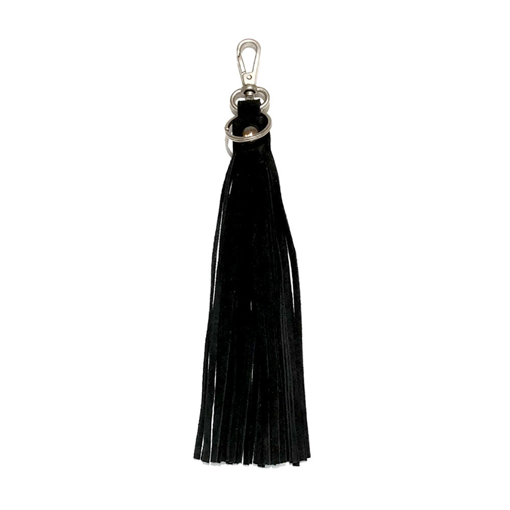 Black Genuine Leather Tassel Bag Charm adds a touch of luxury to any bag. Made from high-quality leather, it is durable and stylish. Its classic design will elevate any handbag or backpack, and its versatility allows easy customization and personalization. Add a chic touch to your bag today.