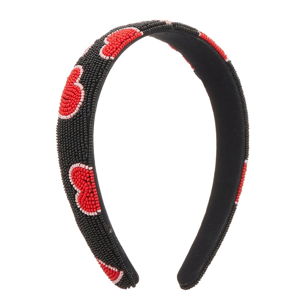 Black Seed Beaded Heart Patterned Padded Headband, features a stunning heart pattern and comfort. Constructed with quality materials, this headband is soft and adjustable for a perfect fit. Show your unique style with this eye-catching accessory. Perfect gift accessory idea for fashion-loving friends and family members.