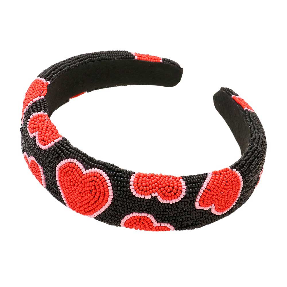 Black Seed Beaded Heart Patterned Padded Headband, features a stunning heart pattern and comfort. Constructed with quality materials, this headband is soft and adjustable for a perfect fit. Show your unique style with this eye-catching accessory. Perfect gift accessory idea for fashion-loving friends and family members.