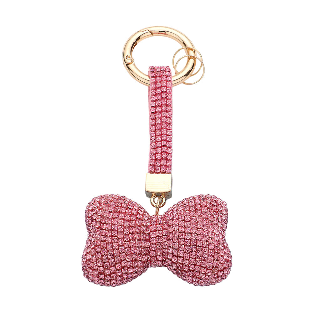 Pink Bling Bow Keychain is a stylish and functional accessory that adds a touch of elegance to your everyday routine. With its eye-catching design and sturdy construction, this keychain is the perfect combination of fashion and convenience. Keep your keys organized and make a statement with the Bling Bow Keychain.