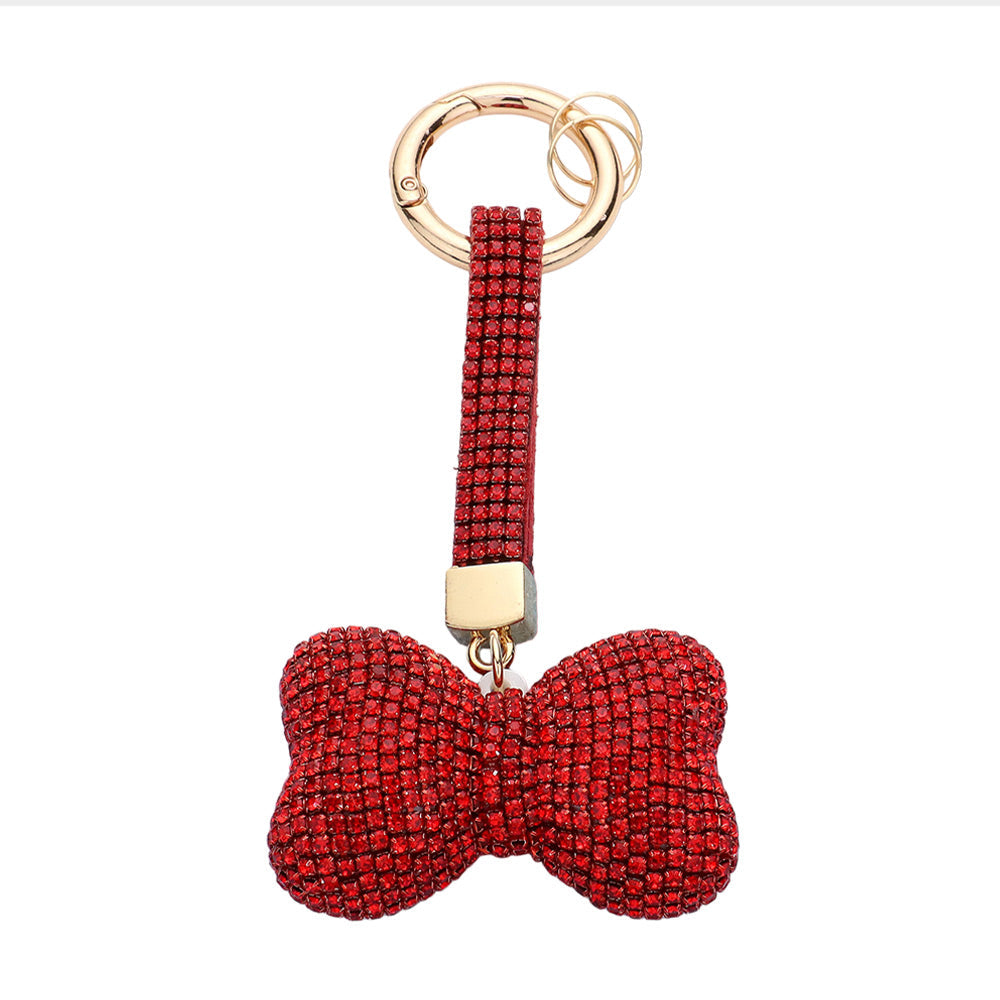Red Bling Bow Keychain is a stylish and functional accessory that adds a touch of elegance to your everyday routine. With its eye-catching design and sturdy construction, this keychain is the perfect combination of fashion and convenience. Keep your keys organized and make a statement with the Bling Bow Keychain.