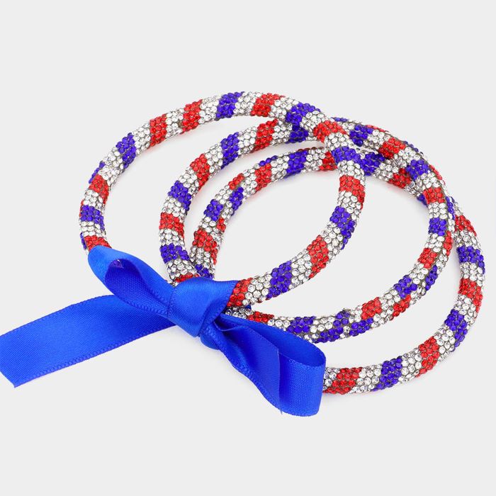 Blue, Clear, Red Elegant stretch bracelet featuring sparkling crystals in a striking design. Perfect accessory for adding glamour to any outfit, ideal for parties, holidays, and special occasions.
