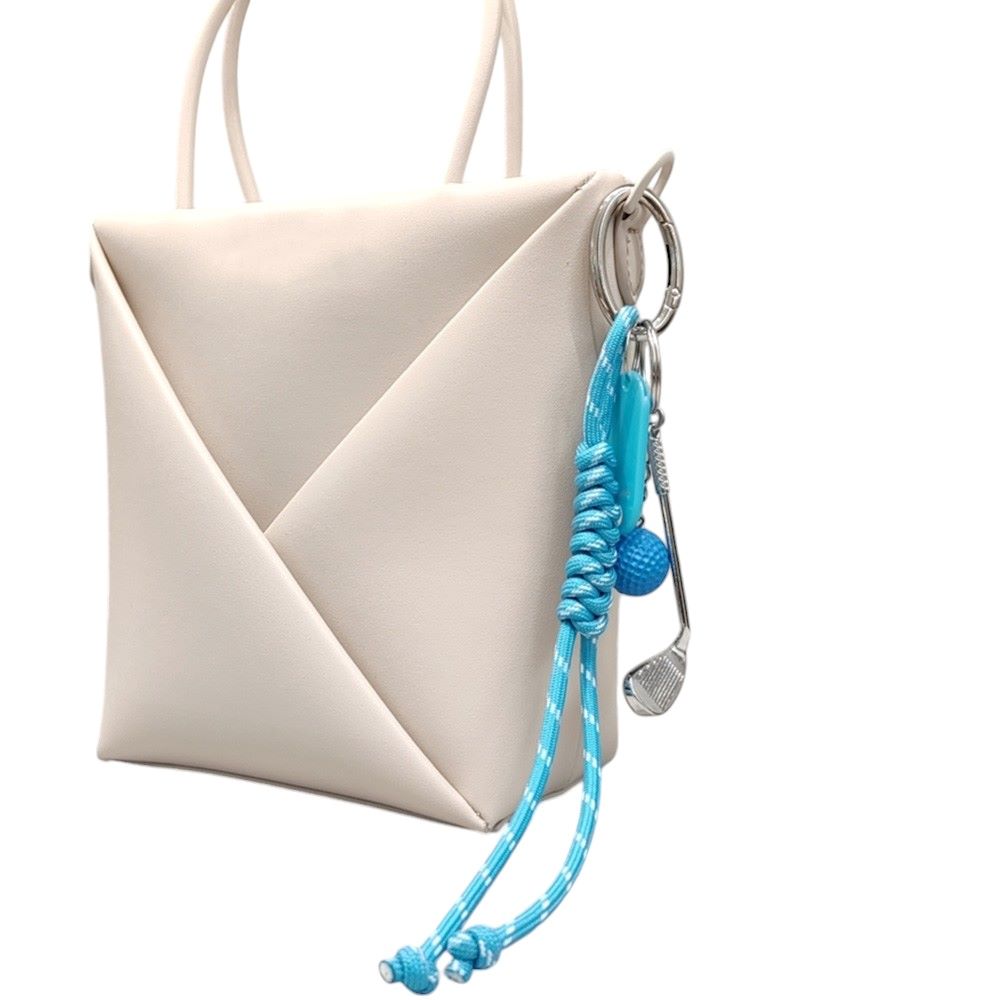 Blue-Golf Name Tag Braided Thread Key Chain / Bag Charm is the perfect accessory for any golf enthusiast. Its durable braided thread design ensures longevity while its versatile use as a key chain or bag charm makes it a convenient addition to any golf gear. Show off your love for the game with this stylish and practical accessory.