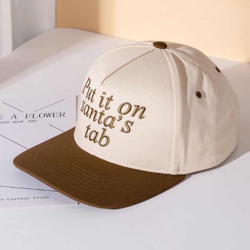 Add festive humor to your look with the Put It on Santa’s Tab baseball cap, a playful embroidered hat perfect for holiday parties, casual outings, or gifting. A fun seasonal accessory that spreads cheer while keeping your style relaxed and trendy.
