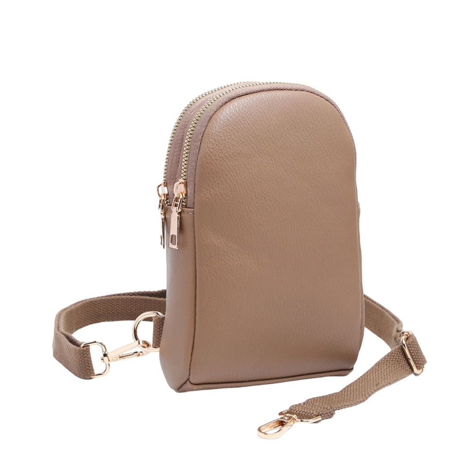 Brown Solid Faux Leather Sling Bag, is the perfect combination of style and convenience. Crafted from durable faux leather, it can withstand daily wear and tear and its adjustable shoulder strap ensures a comfortable fit. Perfect Birthday Gift, Anniversary Gift, Mother's Day Gift, Graduation Gift, Valentine's Day Gift.