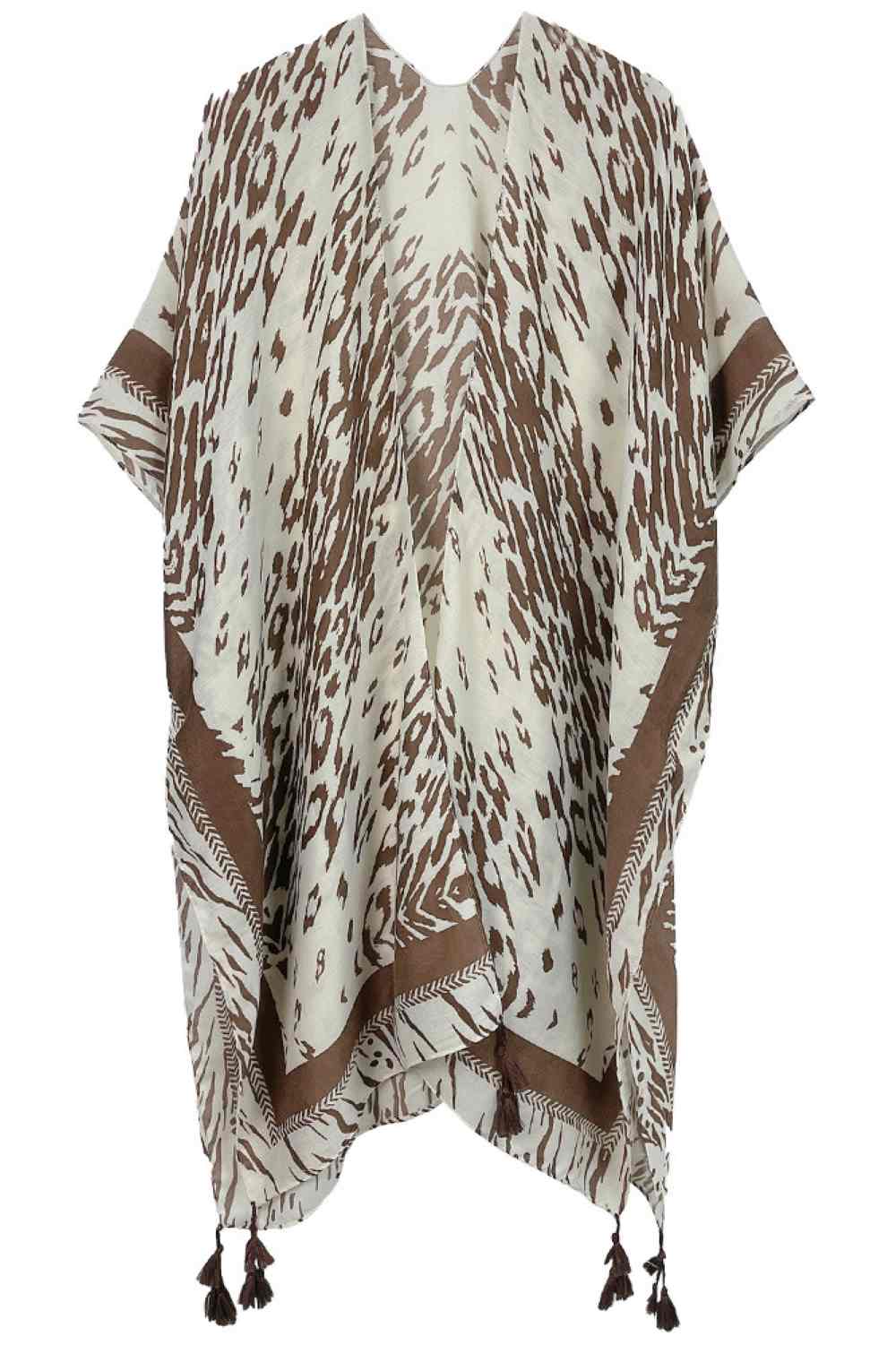 Brown Embrace wild elegance with this Animal Print Tassel Kimono. Crafted from lightweight 100% polyester, this versatile piece features a striking animal print design and decorative tassels that add movement and flair. Perfect for layering over dresses, swimwear, or casual outfits, it drapes beautifully with a generous 35.4" x 35.4" cut. Whether you're heading to the beach, a festival, or a night out, this kimono effortlessly elevates any look with bohemian charm and contemporary style.