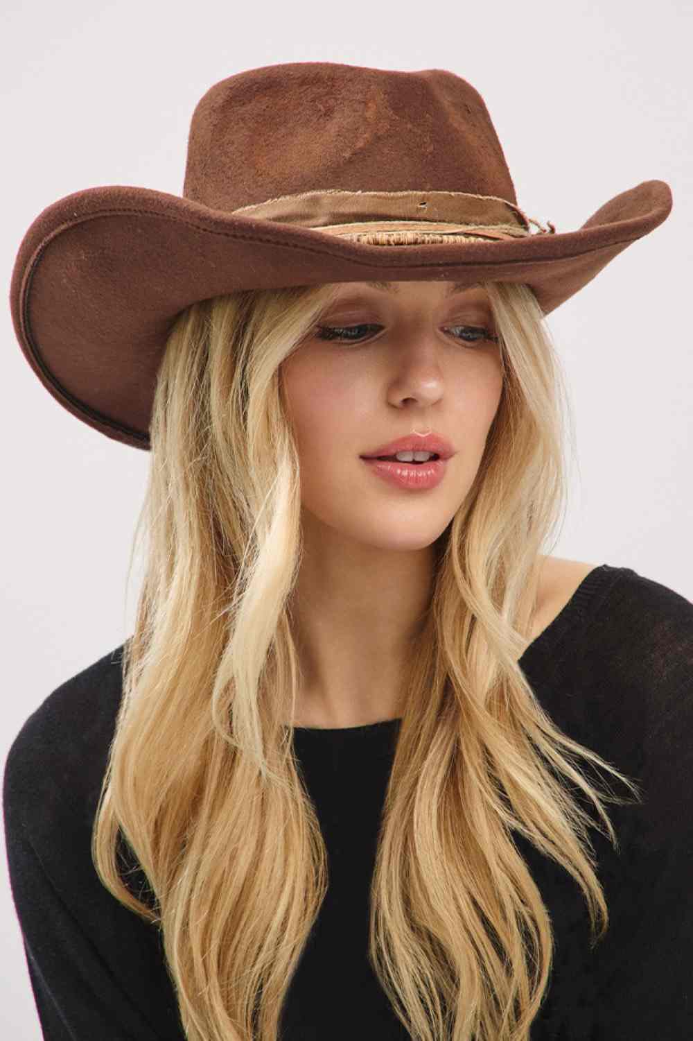 Brown Two iconic looks, one hat! This Cowboy Hat's flexible brim allows for effortless shaping, letting you wear it as a classic cowboy hat or style it as a contemporary fedora.