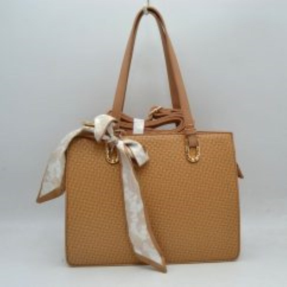 Brown Embrace a perfect blend of seasonal charm and sophisticated style with this elegant woven straw satchel bag. Designed with a beautifully textured basket-weave exterior body and smooth top trim panels, this handbag features a stylish patterned scarf tied in a bow at the handle base for a chic, feminine touch. The structured silhouette opens to a spacious main compartment that easily accommodates your daily essentials, making it an ideal companion for warm-weather outings, brunch, or casual workdays.