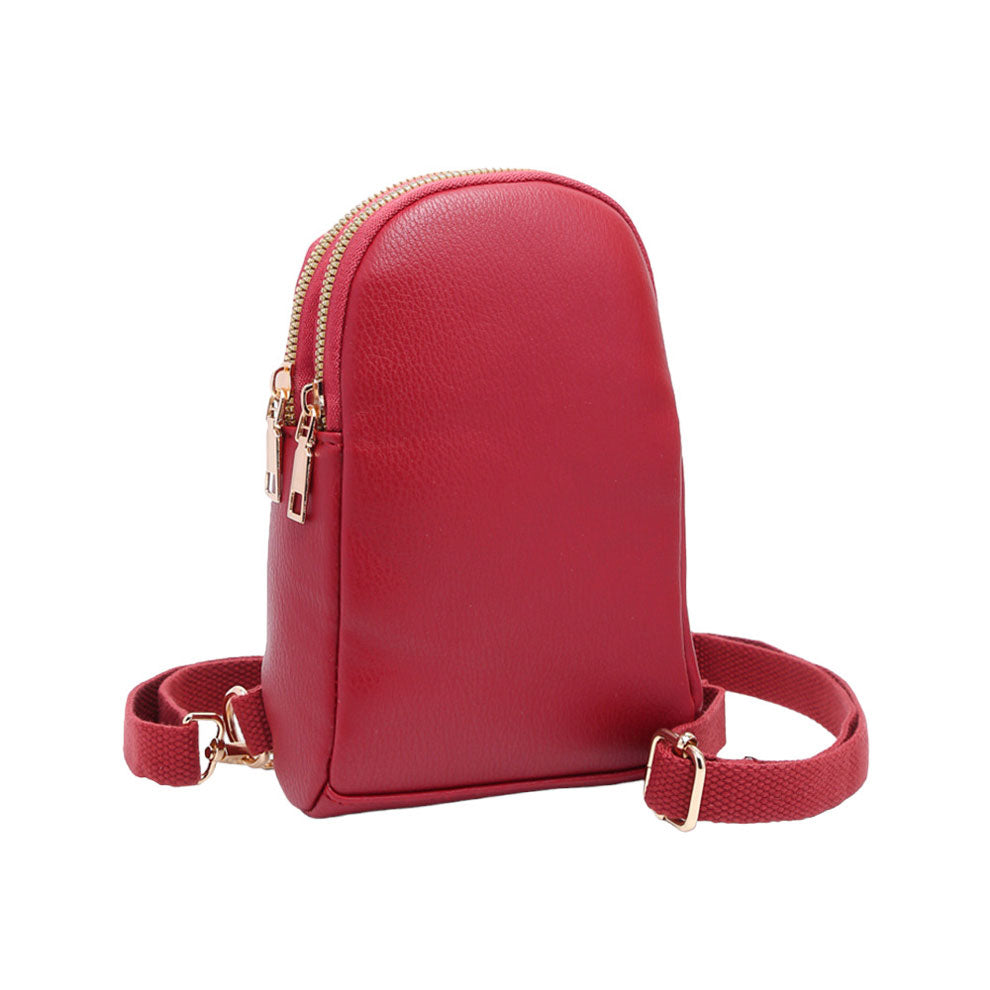 Burgundy Solid Faux Leather Sling Bag, is the perfect combination of style and convenience. Crafted from durable faux leather, it can withstand daily wear and tear and its adjustable shoulder strap ensures a comfortable fit. Perfect Birthday Gift, Anniversary Gift, Mother's Day Gift, Graduation Gift, Valentine's Day Gift.