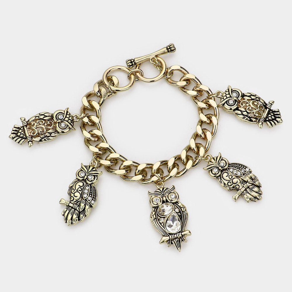 Madeline Love Clear, Gold Burnished Multi Owl Charm Toggle Bracelet - Bracelets
