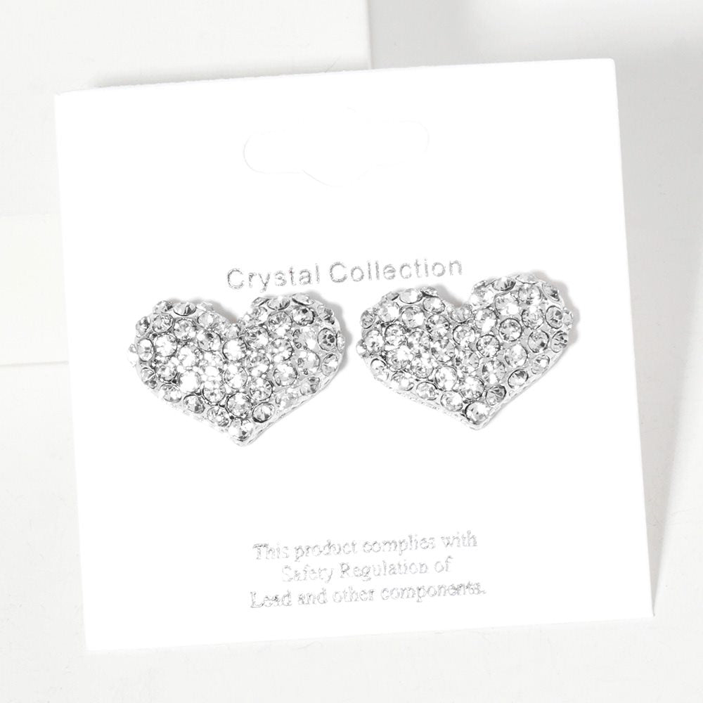 Clear-Rhodium-Crystal Pave Heart Stud Earrings offer a stunning addition to any outfit. The pave heart design adds a touch of elegance and sparkle, while the high-quality crystals provide a timeless shine. Perfect for both formal and casual occasions, these earrings are a must-have for any jewelry collection.