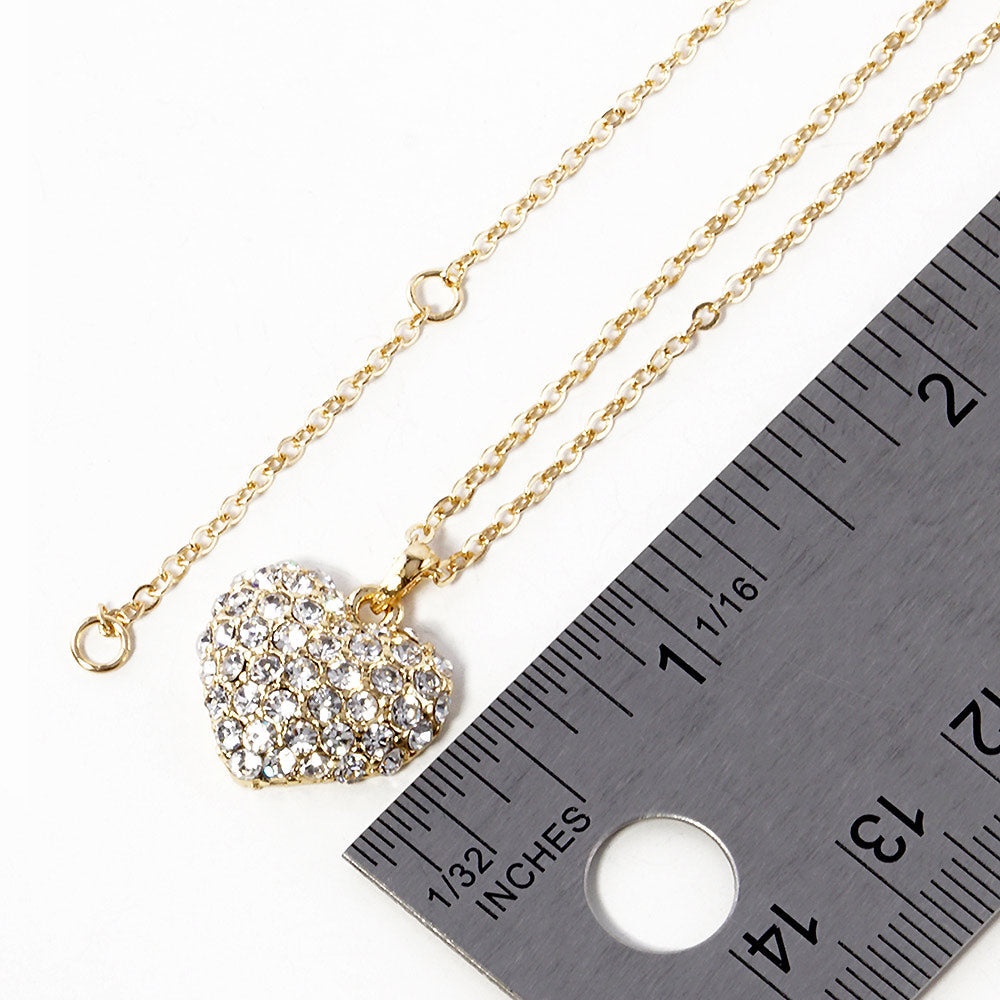 Crystal Pave Heart Pendant Necklace is crafted to bring a touch of sophistication to any outfit. Its sparkling pave crystals are timeless and elegant, while the heart-shaped pendant symbolizes love and affection. Made from high-quality materials, this necklace is designed to make a statement and elevate your style effortlessly.