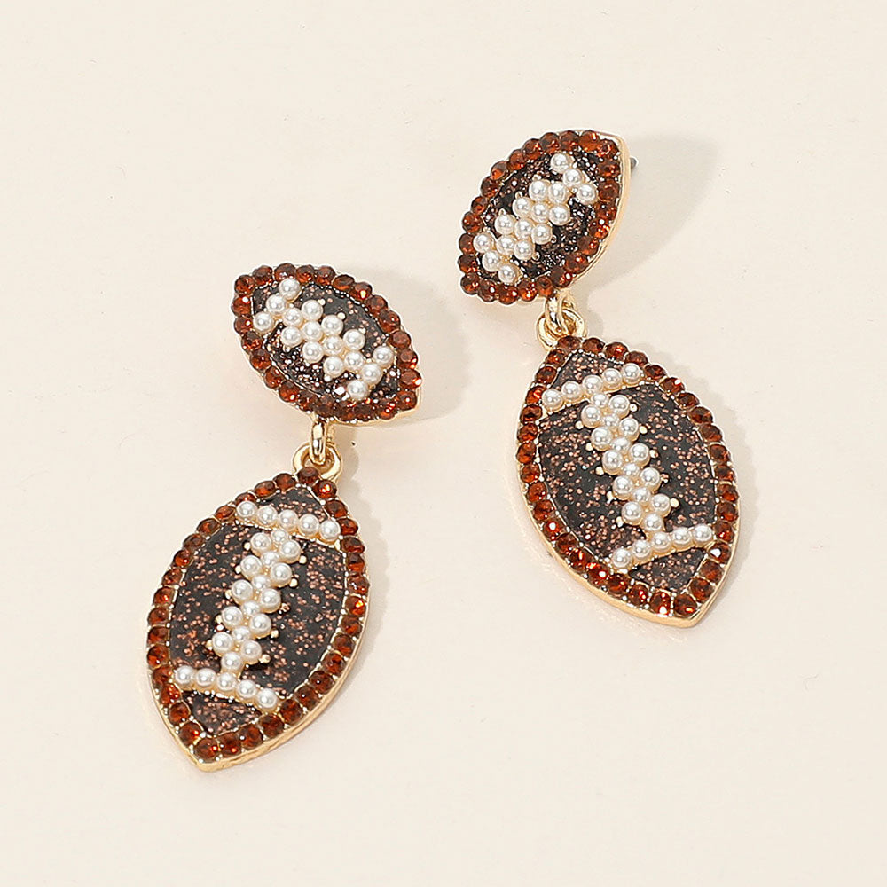 Madeline Love Brown, Gold Rhinestone Pearl Embellished Football Dangle Earrings