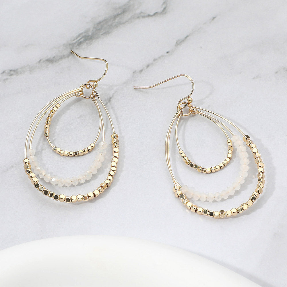 Madeline Love Gold, White Metal Ball Faceted Beaded Triple Wire Teardrop Layered Dangle Earrings