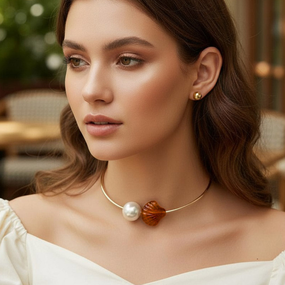 Madeline Love Brown, Worn Gold Bold Pearl Resin Seashell Tip Open Bangle Necklace - Necklaces