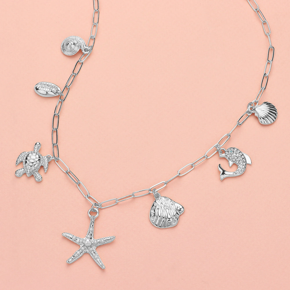 Clear, Silver Puka Shell Turtle Starfish Dolphin Charm Station Paperclip Chain Necklace