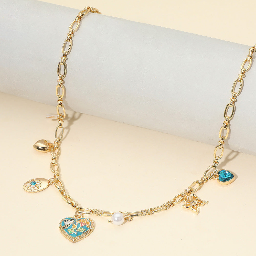 Madeline Love Gold, Turquoise Butterfly Flower Enamel Detailed Heart Pendant Charm Station Necklace - Necklaces