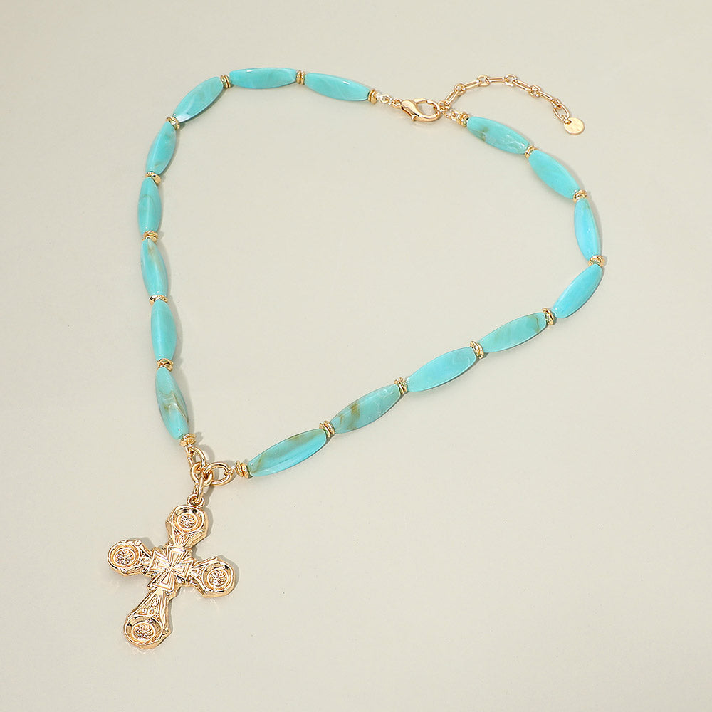 Madeline Love Turquoise Bold Elegant Cross Pendant Chunky Resin Beaded Statement Necklace