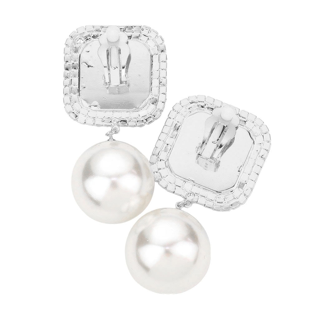Fuchsia Square Stone Pearl Link Dangle Evening Clip on Earrings, make a fashionable addition to any ensemble. Crafted with a unique square stone and pearl link, these eye-catching earrings are perfect for any formal or special occasion. These clip-on earrings offer a secure fit and ensure complete comfort throughout the night.