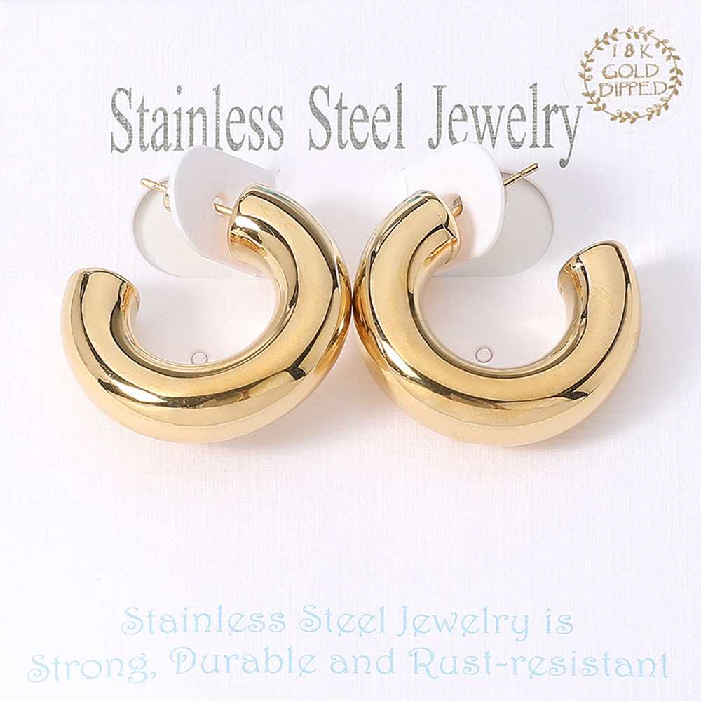 Gold 18K Gold Dipped Stainless Steel Chunky Hoop Earrings. Made with high-quality stainless steel and dipped in 18K gold, these earrings are durable and stylish. Add a touch of elegance to any outfit with these classic chunky hoops. Perfect for any occasion, these earrings are a must-have addition to your jewelry collection.