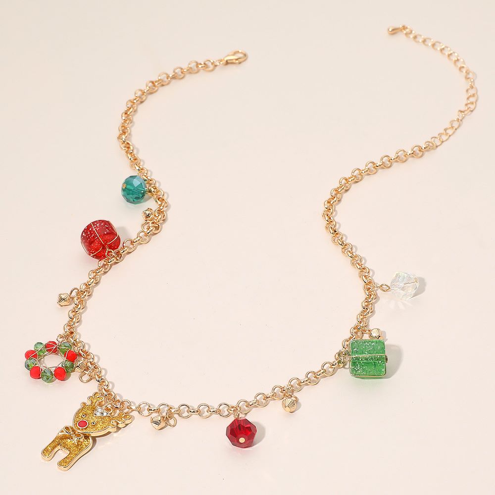 Bring festive joy to your style with this Christmas reindeer charm necklace featuring holiday-themed pendants like a wreath, gift, and sparkling beads. Designed on a delicate chain, this playful accessory is perfect for parties, gifting, or adding cheerful charm to your holiday outfits.