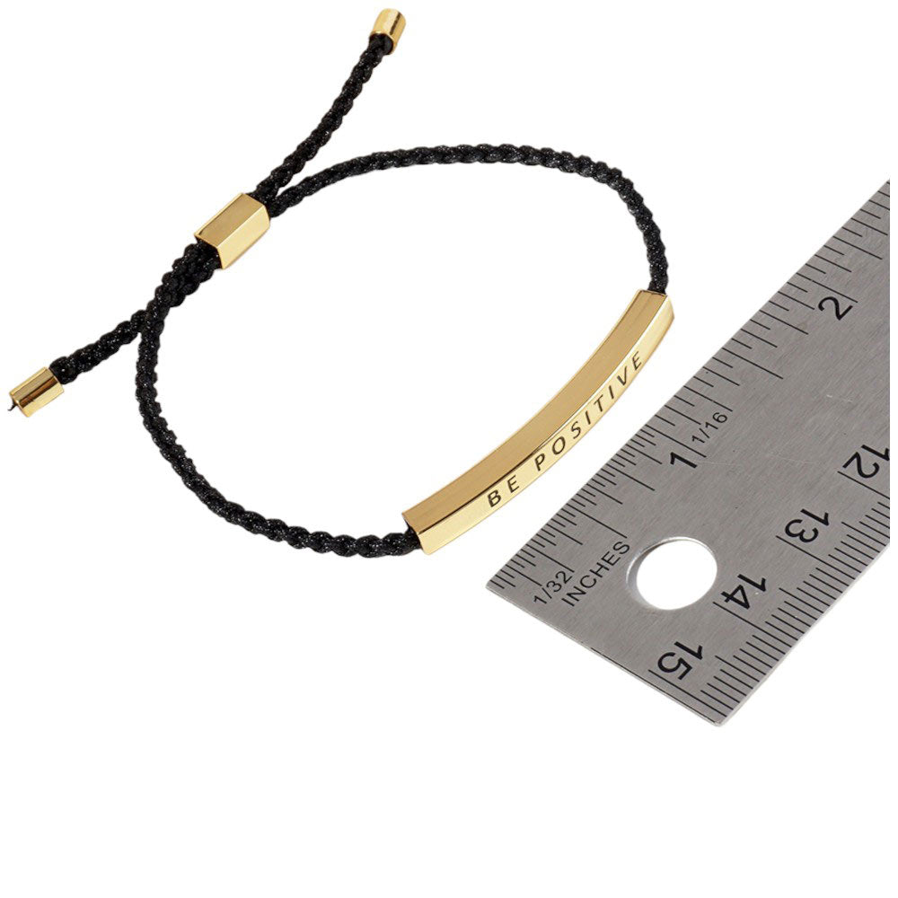 Gold-Dipped WARRIOR Message Bar Pointed Rope Adjustable Cinch Pull Tie Bracelet, Featuring an adjustable cinch pull tie, it provides both style and functionality. With a dipped WARRIOR message bar and pointed rope design, this bracelet is the perfect accessory for any occasion.