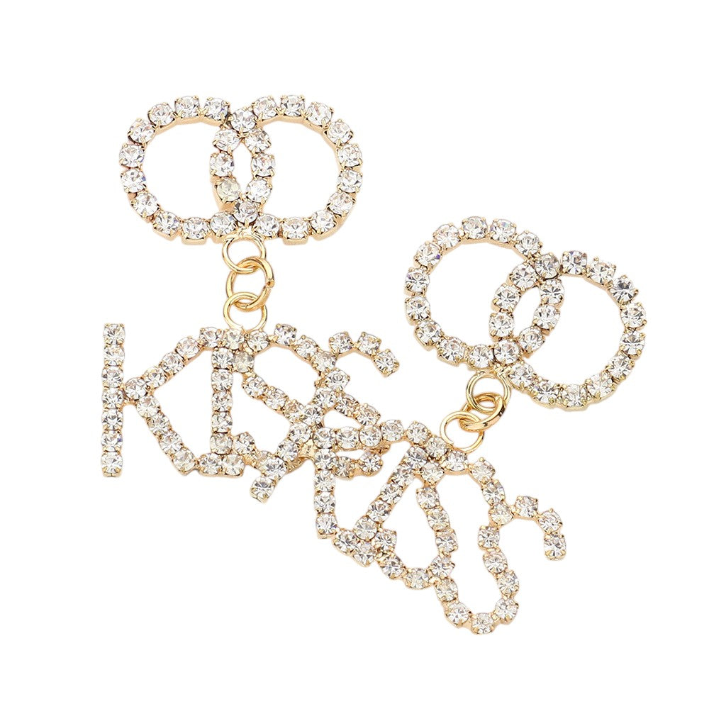 Gold KISS Rhinestone Embellished Message Dangle Earrings are the perfect accessory to add a touch of glamour to any outfit. The delicate dangle design adds movement and sparkle to your look, making you stand out from the crowd. Own these stunning earrings and shine like a star.