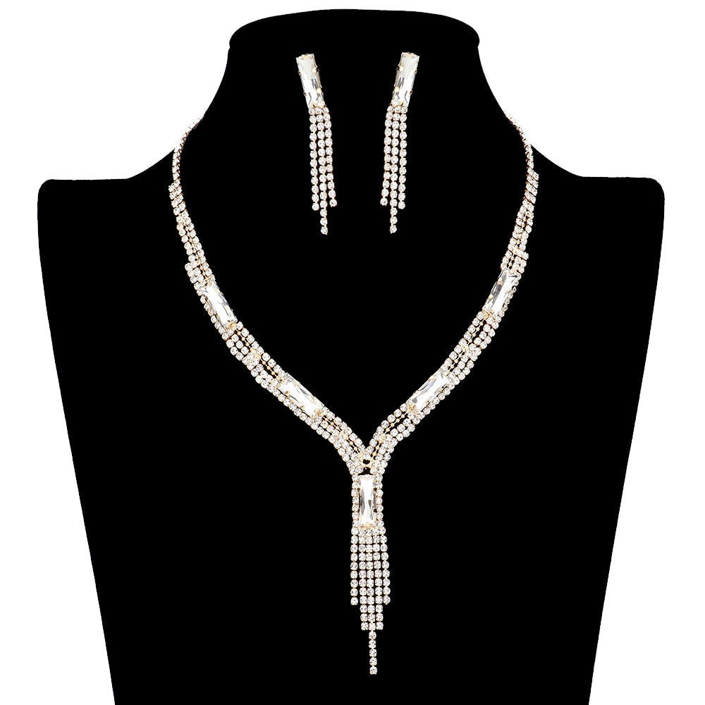 Gold Rectangle Stone Accented Rhinestone Fringe Tip Jewelry Set, perfect for adding a touch of elegance to any special occasion outfit. Featuring a beautiful rectangle stone accent, this necklace and earring set will be a unique addition to any jewelry collection. Perfect gift choice for loved ones on any special day.