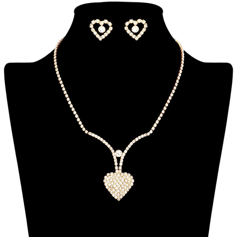 Gold Rhinestone Paved Heart Necklace adds a touch of elegance and sparkle to any outfit. The rhinestone pave design catches the light and draws attention to the delicate heart pendant. Made with high-quality materials, this necklace is durable and perfect for any occasion.