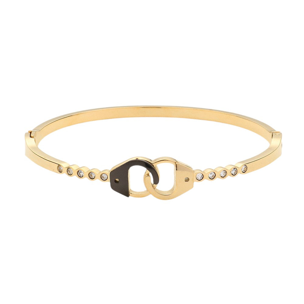 Gold Stainless Steel Stone Paved Handcuff Hinged Bangle Bracelet is the perfect combination of style and durability. Crafted with high-quality stainless steel and adorned with sparkling stones, this bracelet is sure to make a statement. The hinged design adds comfort and versatility. A must-have accessory for any fashion-forward individual.