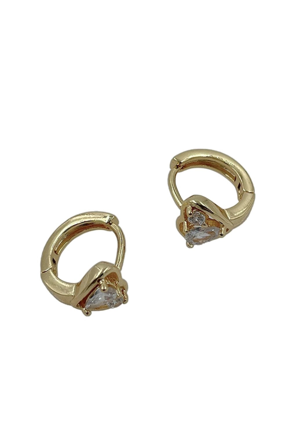 Gold Elegant huggie hoop earrings crafted with 14K gold and white gold dipping for a luxurious finish. Features cubic zirconia pavé detailing that catches light beautifully. The 1.7cm diameter offers a delicate, versatile size perfect for everyday wear or special occasions. Made from hypoallergenic brass with cubic zirconia stones, these earrings are gentle on sensitive skin.