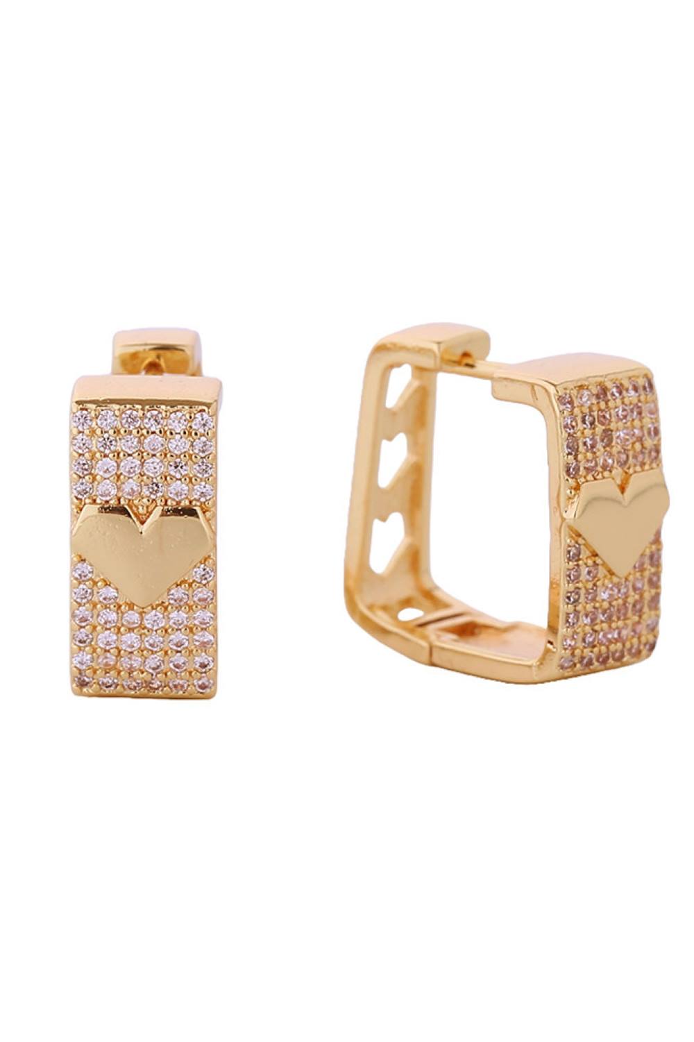 Gold Elegant heart-in-square huggie earrings crafted in 14K gold or white gold-dipped brass with sparkling cubic zirconia accents. Measuring 1.7cm, these petite hoops offer a delicate yet striking design perfect for everyday wear or special occasions. Hypoallergenic construction ensures comfort for sensitive ears. Lead and nickel compliant for peace of mind. Expertly made in Korea with attention to quality craftsmanship.