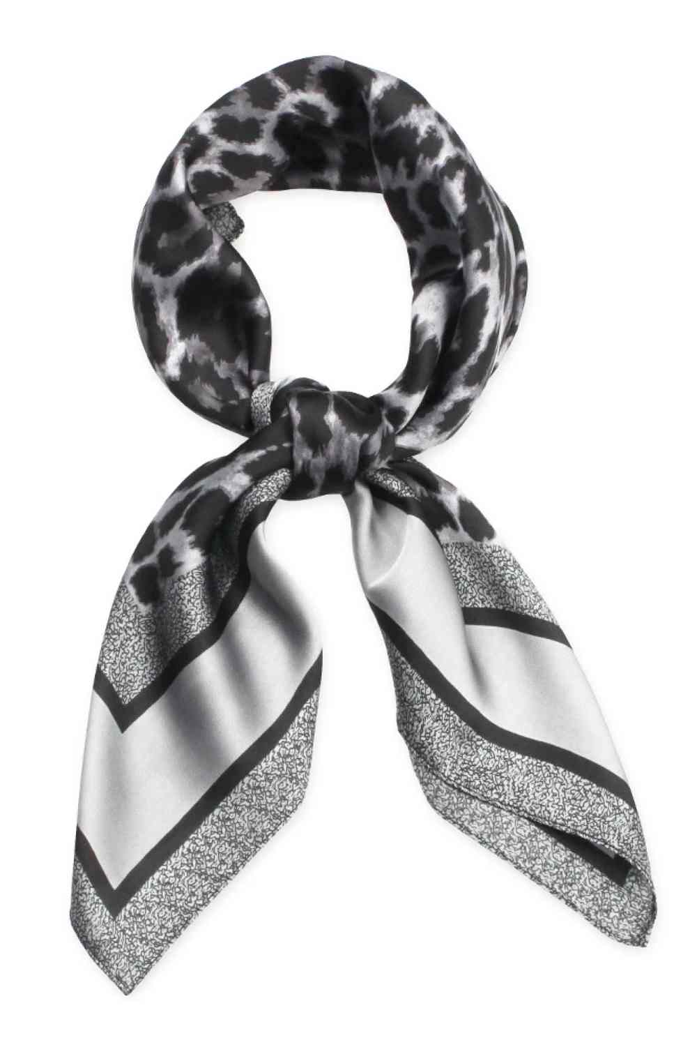 Gray Elevate your accessory game with this luxurious leopard pattern satin square scarf. The timeless animal print adds instant sophistication to any outfit, whether draped around your neck, tied as a headscarf, or styled as a chic belt accent. Crafted from 100% polyester with a smooth satin finish, this scarf offers a silky-soft feel against your skin while maintaining its shape and sheen. The generous 27.5" x 27.5" dimensions provide versatile styling options for endless looks.