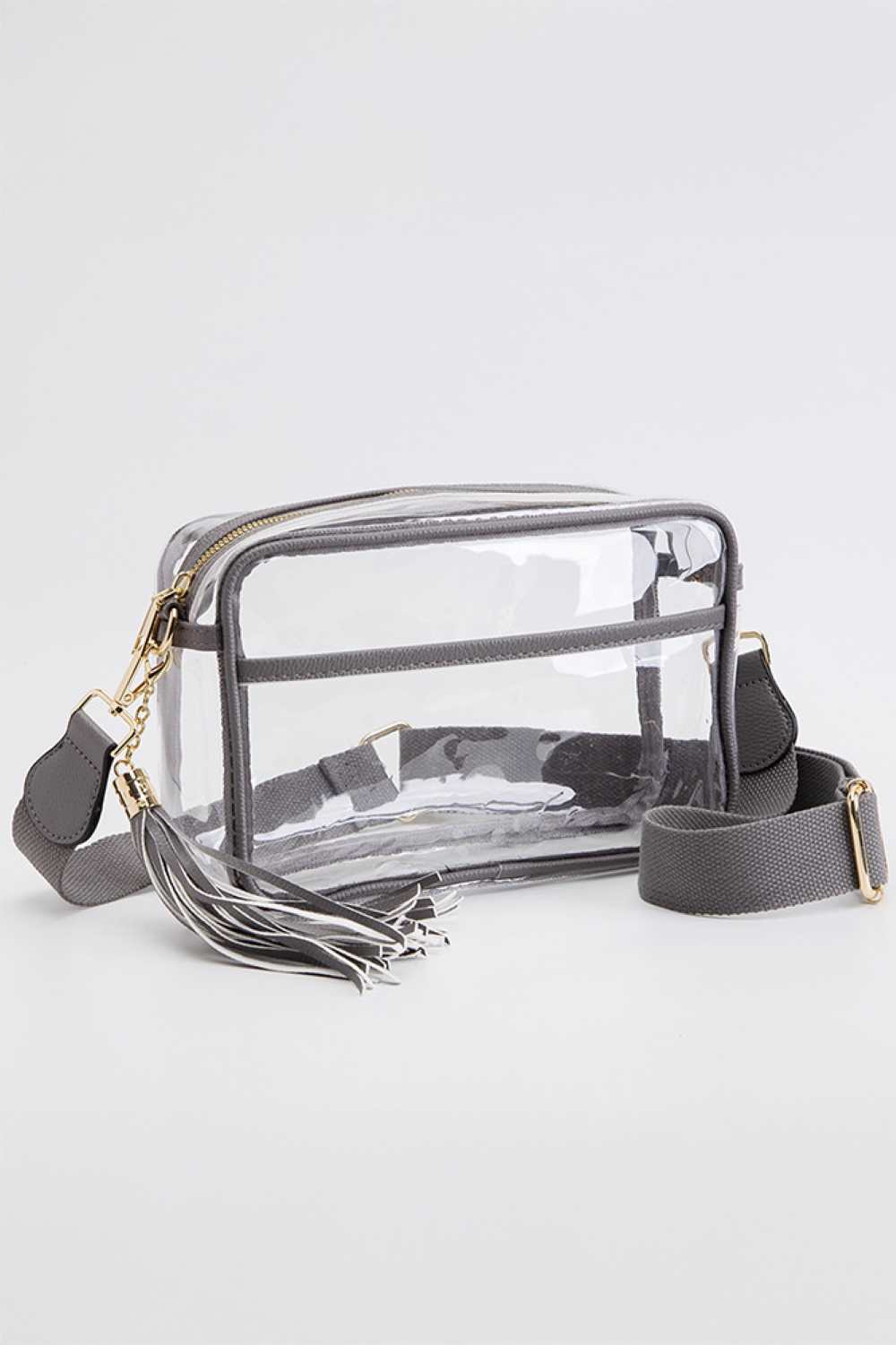 Gray Clear PU Cross Body Camera Bag offers a sleek, transparent design crafted from durable polyurethane, providing both style and protection for your camera gear. Its crossbody strap ensures comfortable, hands-free carrying, while the clear material allows quick visibility of contents for easy access. Ideal for photographers seeking a practical yet modern solution to transport and safeguard their equipment.