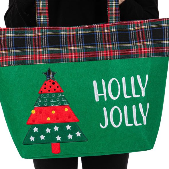 Celebrate the season with this “HOLLY JOLLY” tote bag featuring a cheerful Christmas tree design and plaid accents. Spacious and fun, it’s ideal for shopping, gifting, or carrying holiday essentials in festive style. A perfect companion for seasonal cheer.