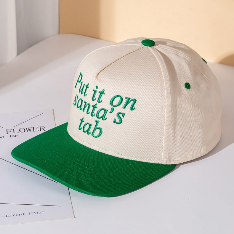 Add festive humor to your look with the Put It on Santa’s Tab baseball cap, a playful embroidered hat perfect for holiday parties, casual outings, or gifting. A fun seasonal accessory that spreads cheer while keeping your style relaxed and trendy.