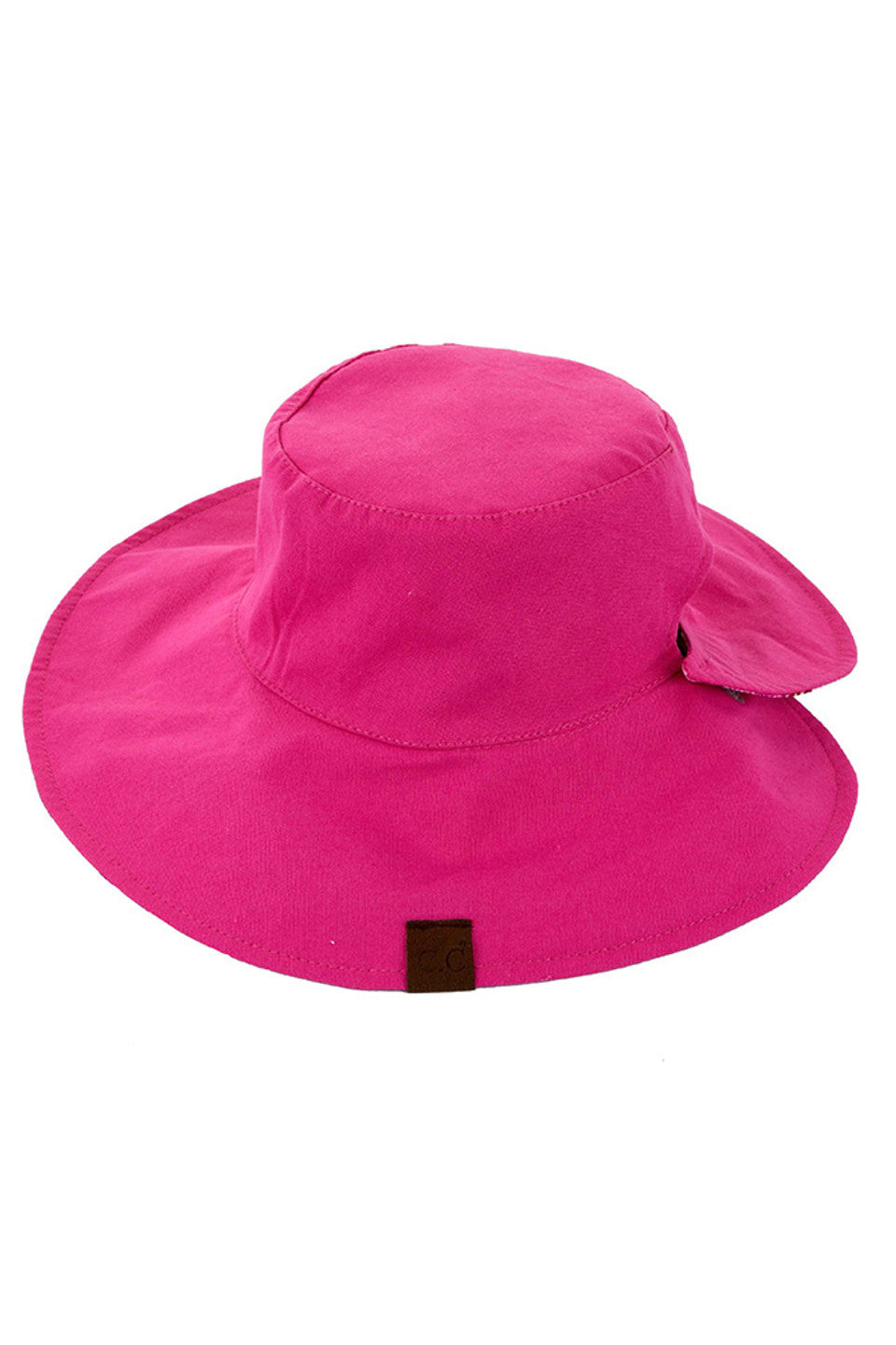 Hot Pink C.C SUN HAT is designed to provide stylish and effective protection from the sun. Made with high-quality materials, it offers UPF 50+ protection and a wide brim for maximum coverage. Stay comfortable and safe in the sun with this expertly crafted sun hat.