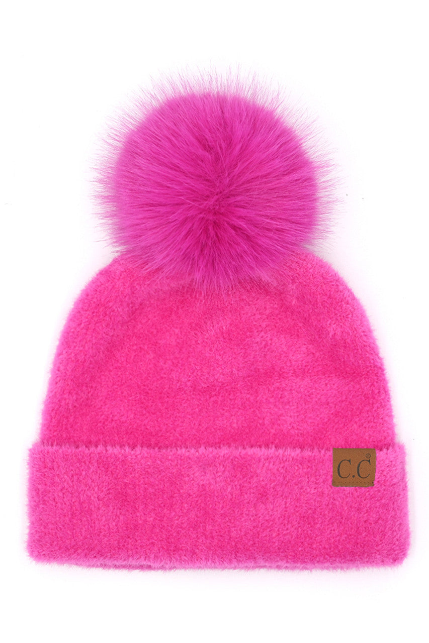 Hot Pink C.C Plush Terry Chenille Pom Beanie Winter Hat combines superior thermal protection with refined style. Constructed from premium terry chenille fabric, this hat delivers exceptional insulation while maintaining breathability. The distinctive pom accent adds visual interest without compromising functionality. Designed with precise dimensions to ensure optimal coverage of ears and forehead, this cold-weather essential maintains its structural integrity throughout extended wear.