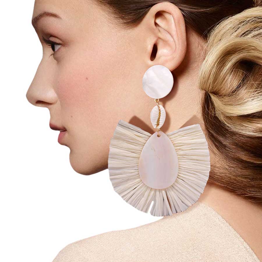 Ivory Puka Shell Mother of Pearl Teardrop Raffia Trimmed Earrings, adorn yourself with these teardrop raffia trimmed earrings! puka shell mother-of-pearl teardrop earrings go perfectly with a t-shirt, summer dress or work clothes, beach party, and many more.