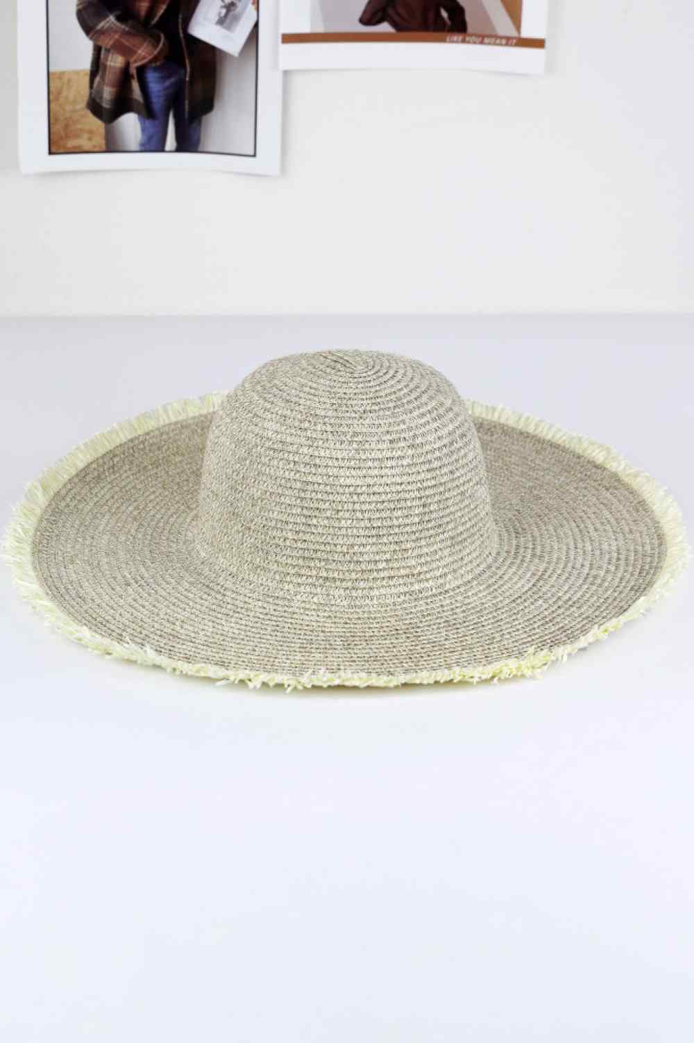Ivory Elevate your warm-weather wardrobe with this charming Frayed Two Tone Mixed Color Straw Floppy Hat. Crafted from 100% paper, this lightweight hat delivers breathable comfort perfect for extended outdoor wear. Ideal for beach days, garden parties, or casual summer outings, this versatile hat pairs beautifully with any warm-weather ensemble.