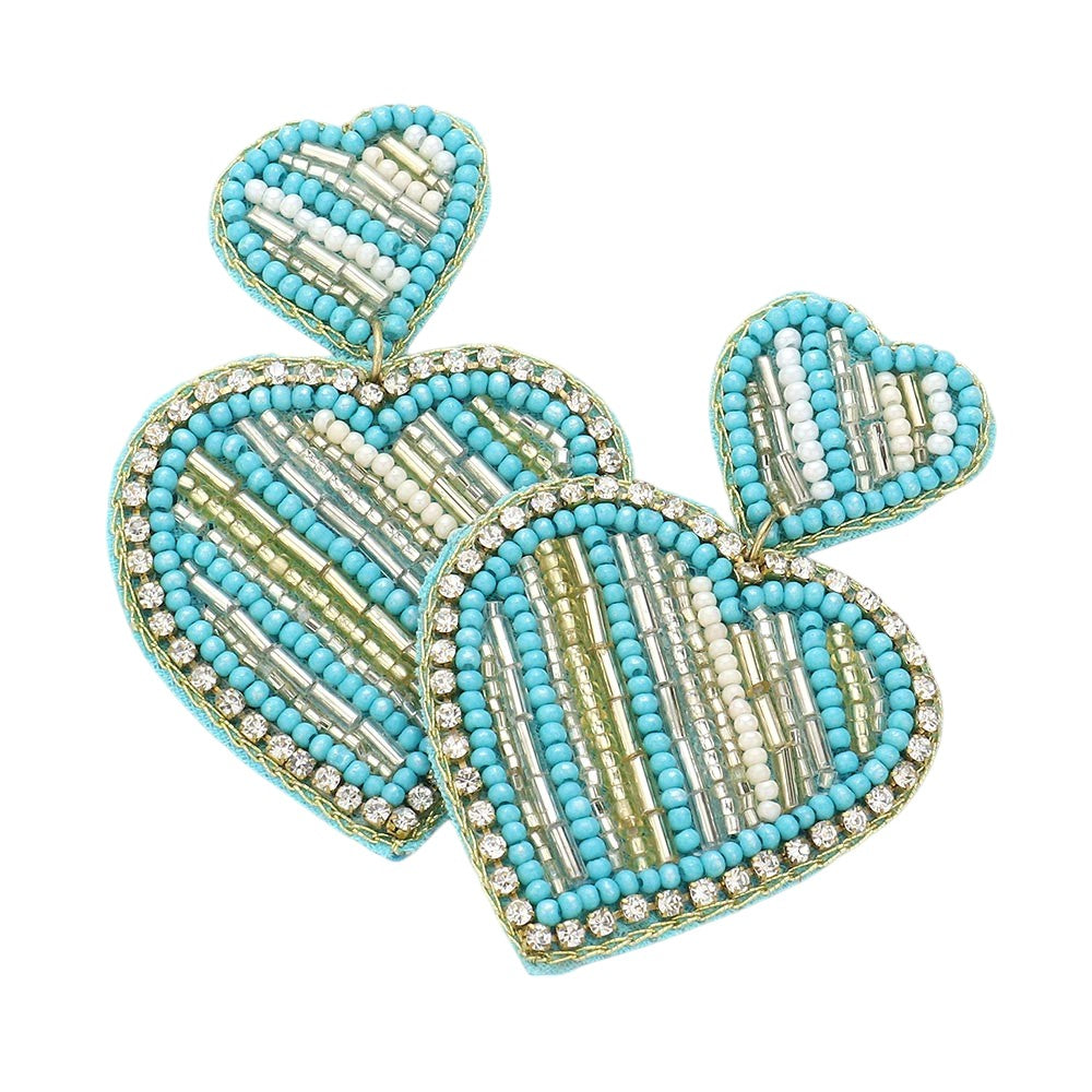 Light Blue Felt Back Beaded Double Heart Link Dangle Earrings are a charming addition to any jewelry collection. The intricate beaded design adds elegance, while the felt backing ensures comfort throughout the day. Perfect for adding a touch of romance to any outfit. Crafted with quality materials for durability and style.