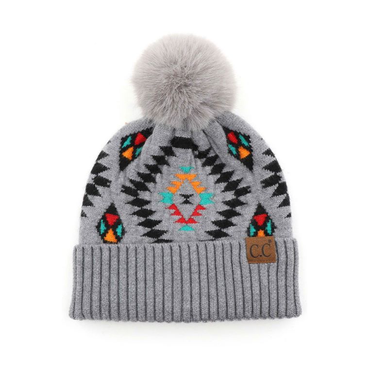 Light Gray C.C Soft Aztec Pattern Beanie with Faux Fur Pom, is beautifully knitted with a variety of colors and design that brings a unique look. Coordinate these aztec pattern beannie with any outfit to match the best with absolute warmth and coziness in style. This is an ideal winter head cover that comes in one size winter cap with a faux fur pom that fits most head sizes. Perfect winter gift accessory for your friends, family, and the persons you love.