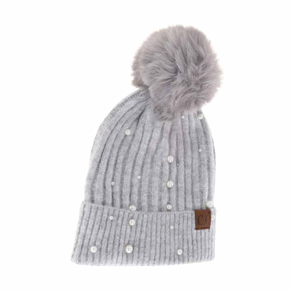 Lt.Grey C.C Pearl Embellishments Pom Pom Beanie Hat, this stylish beanie is made from high-quality material for a comfortable and snug fit. Featuring pearl embellishments and a pom pom detail, this hat is sure to keep you looking stylish and chic in chilly weather. Perfect winter gift for friends and family.